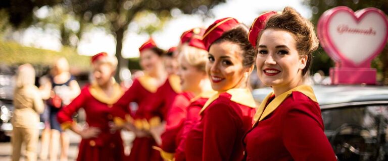 Vintage airline stewardesses in period dress at the Goodwood Revival.