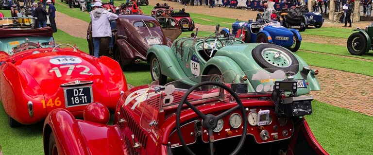 Historic racing cars assembled on Siena's Piazza del Campo during the Mille Miglia.