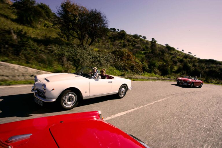 Peugeot 404 Cabriolet by Pininfarina driving through the Madonie Mountains on Sicily's legendary Targa Florio route.