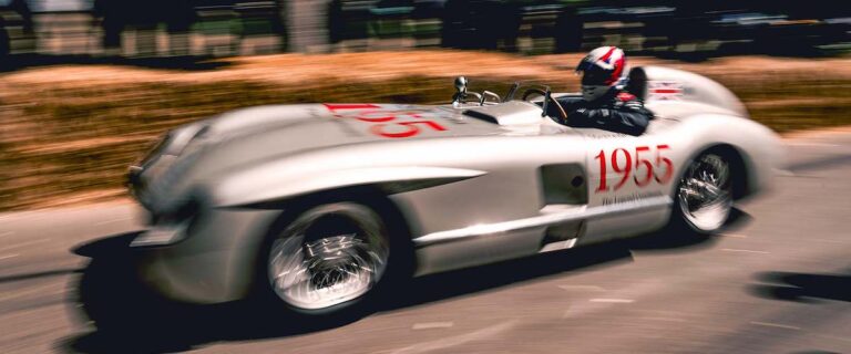 Mercedes-Benz 300 SLR racing up the Goodwood hill climb.