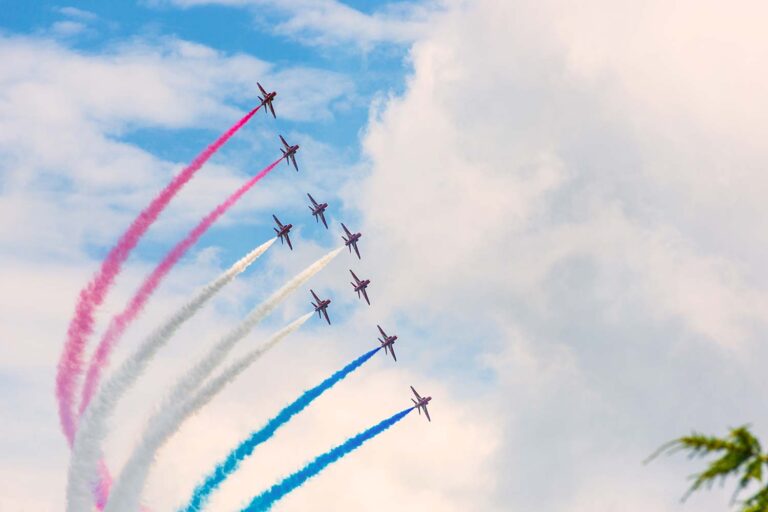Royal Air Force Red Arrows performing above the Goodwood Festival of Speed.
