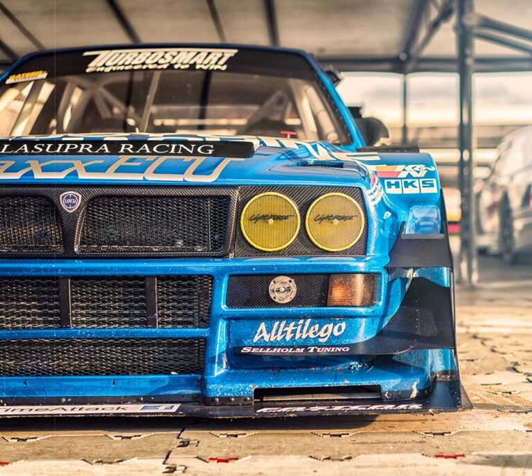 Front view of a Lancia Delta Integrale in the Goodwood Festival of Speed paddock.