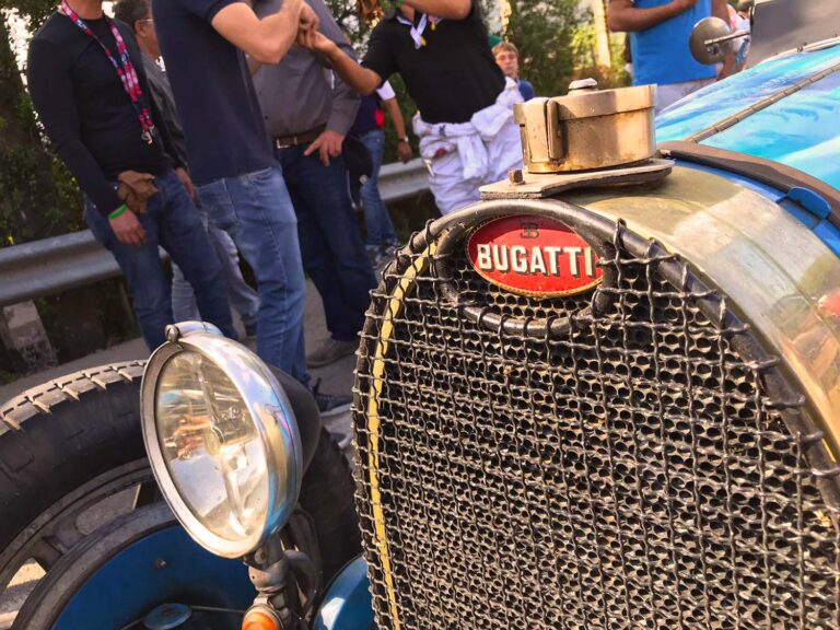 Historic Bugatti radiator grille and emblem at Targa Florio Live in Sicily.