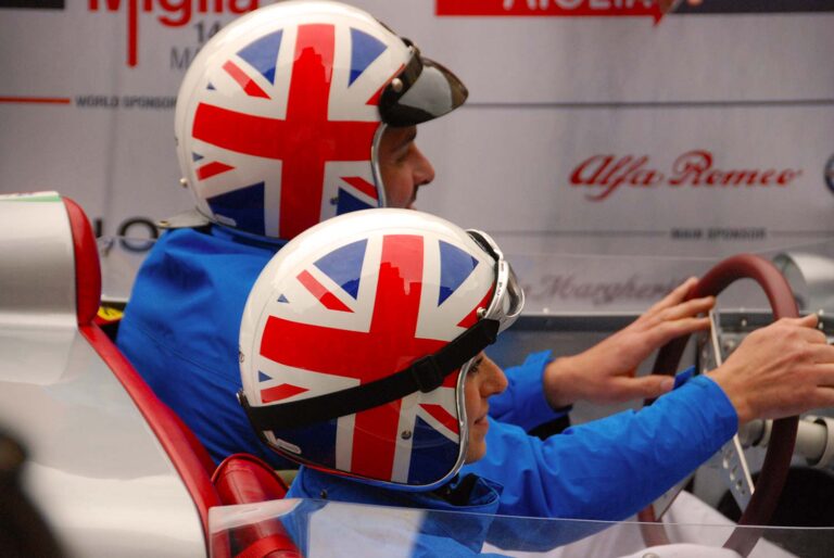 Mille Miglia participants wearing Union Jack helmets.