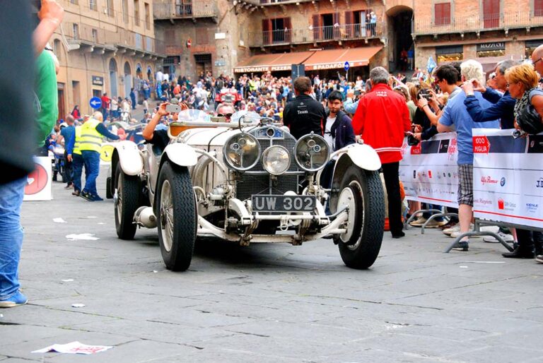 Historic Bentley arriving at the Mille Miglia time control in Siena.